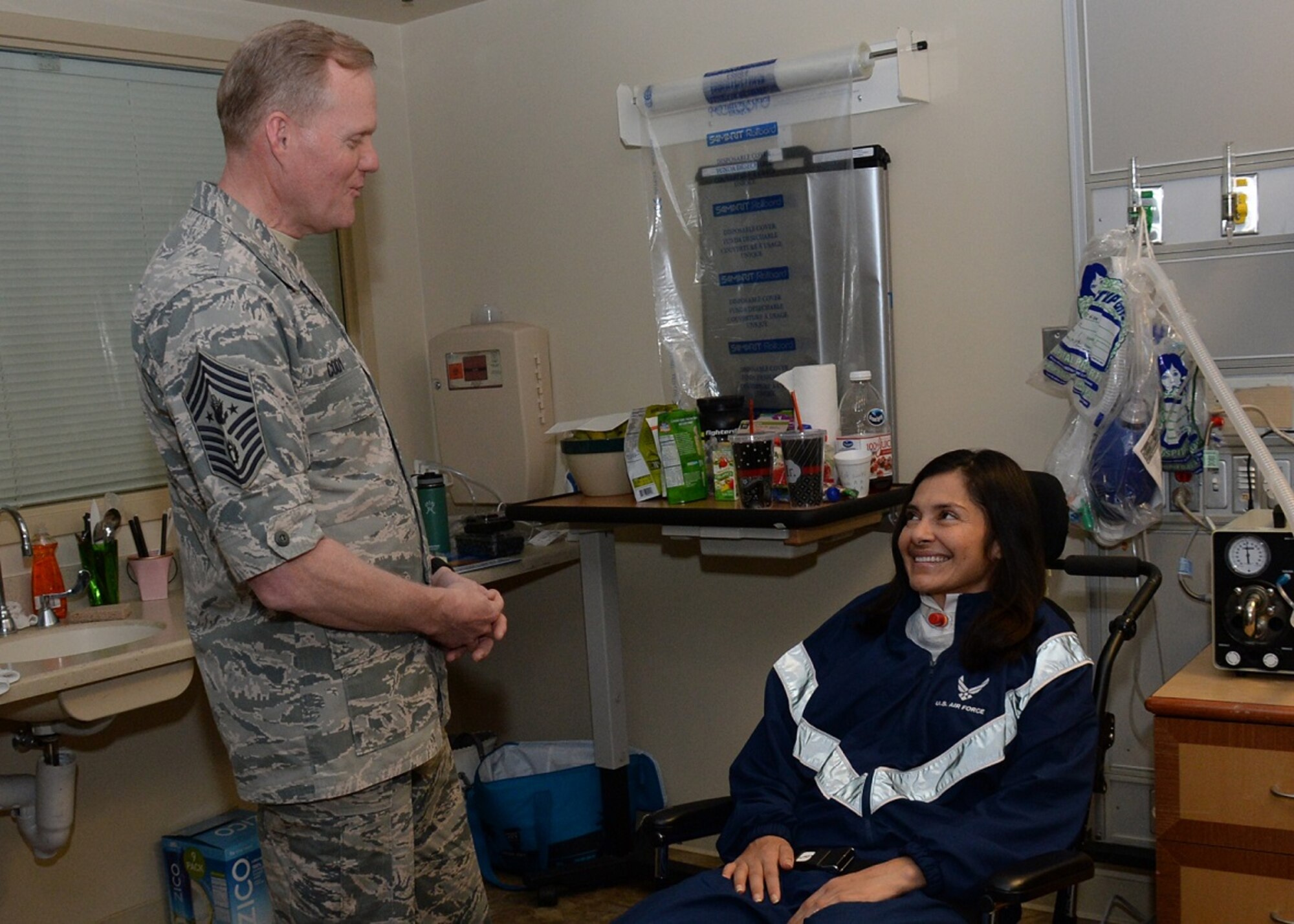 Chief Master Sgt. of the Air Force, James A. Cody paid a personal visit to Maj. Katherine “Kat” Portillo, a wounded warrior from the Space and Missile Systems Center during the CMSAF's tour of Los Angeles Air Force Base in El Segundo, Calif., March 9-10, 2016. Following his full day visit with Airmen at the center, Cody took time to travel to the VA Medical Center in Long Beach with members of SMC’s Space Superiority Directorate. (U.S. Air Force photo/Van De Ha)