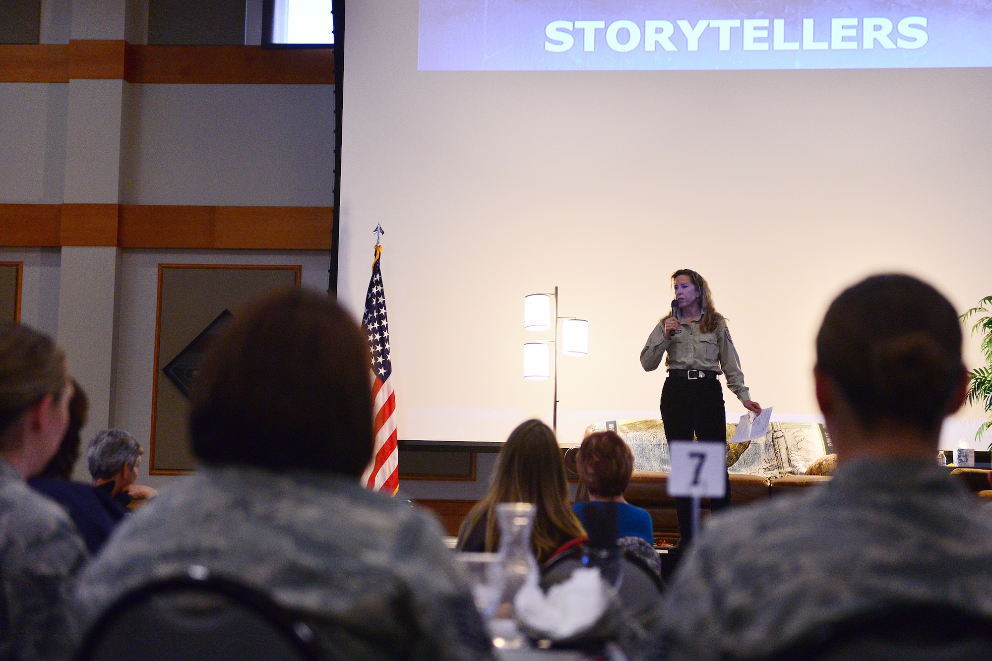 Elin Pierce, 341st Civil Engineering Squadron fish and wildlife biologist, shares the story of her mother’s near-death experience at the Storytellers event held April 1, 2016, at Malmstrom Air Force Base, Mont. Storytellers is a resiliency event held biannually at the base, where individuals are able to share their stories to inspire and empower others during tough times. (U.S. Air Force photo/Airman Daniel Brosam)