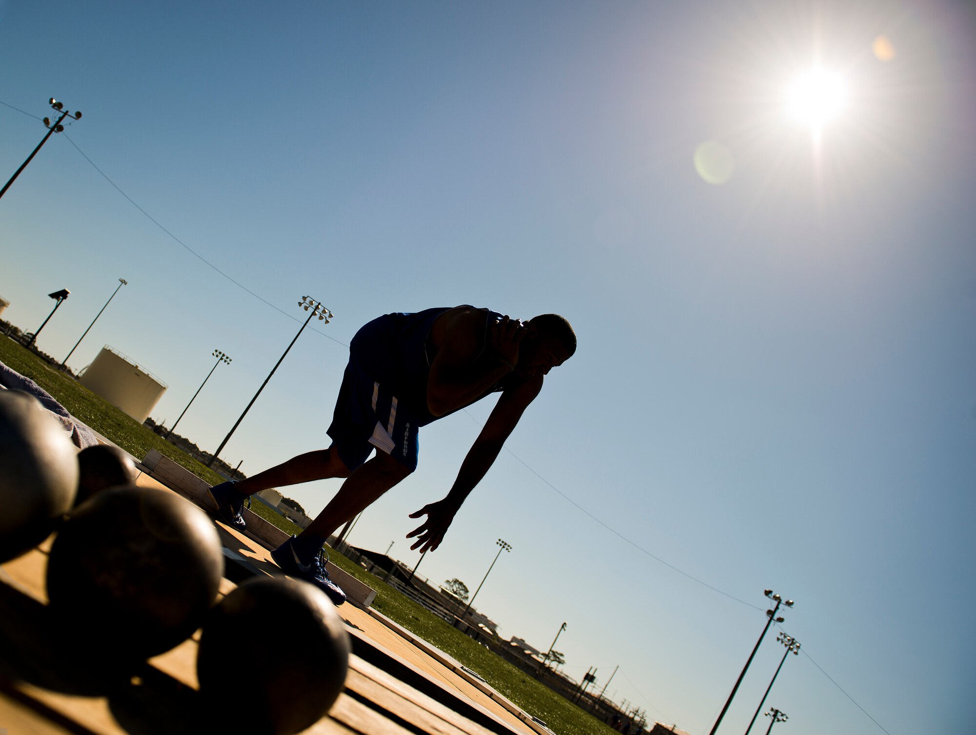 Paul O’Neil, a Warrior Games athlete, prepares to throw during an afternoon track and field session at the Air Force team’s training camp at Eglin Air Force Base, Fla., April 4.  The base-hosted, week-long Warrior Games training camp is the last team practice session before the yearly competition in June.  (U.S. Air Force photo/Samuel King Jr.)