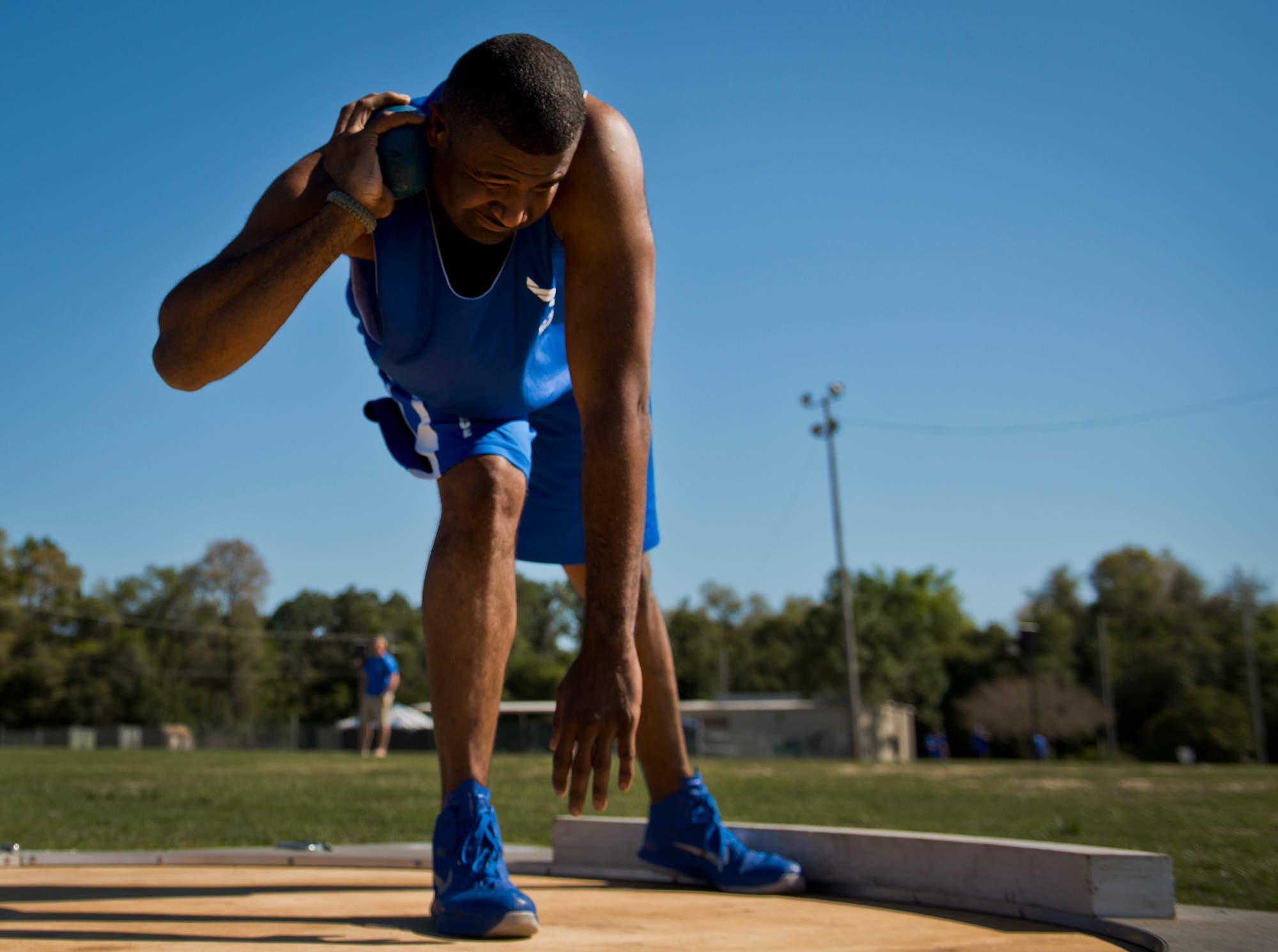 Larry O’Neil, a Warrior Games athlete, prepares to throw during an afternoon track and field session at the Air Force team’s training camp at Eglin Air Force Base, Fla., April 4.  The base-hosted, week-long Warrior Games training camp is the last team practice session before the yearly competition in June.  (U.S. Air Force photo/Samuel King Jr.)