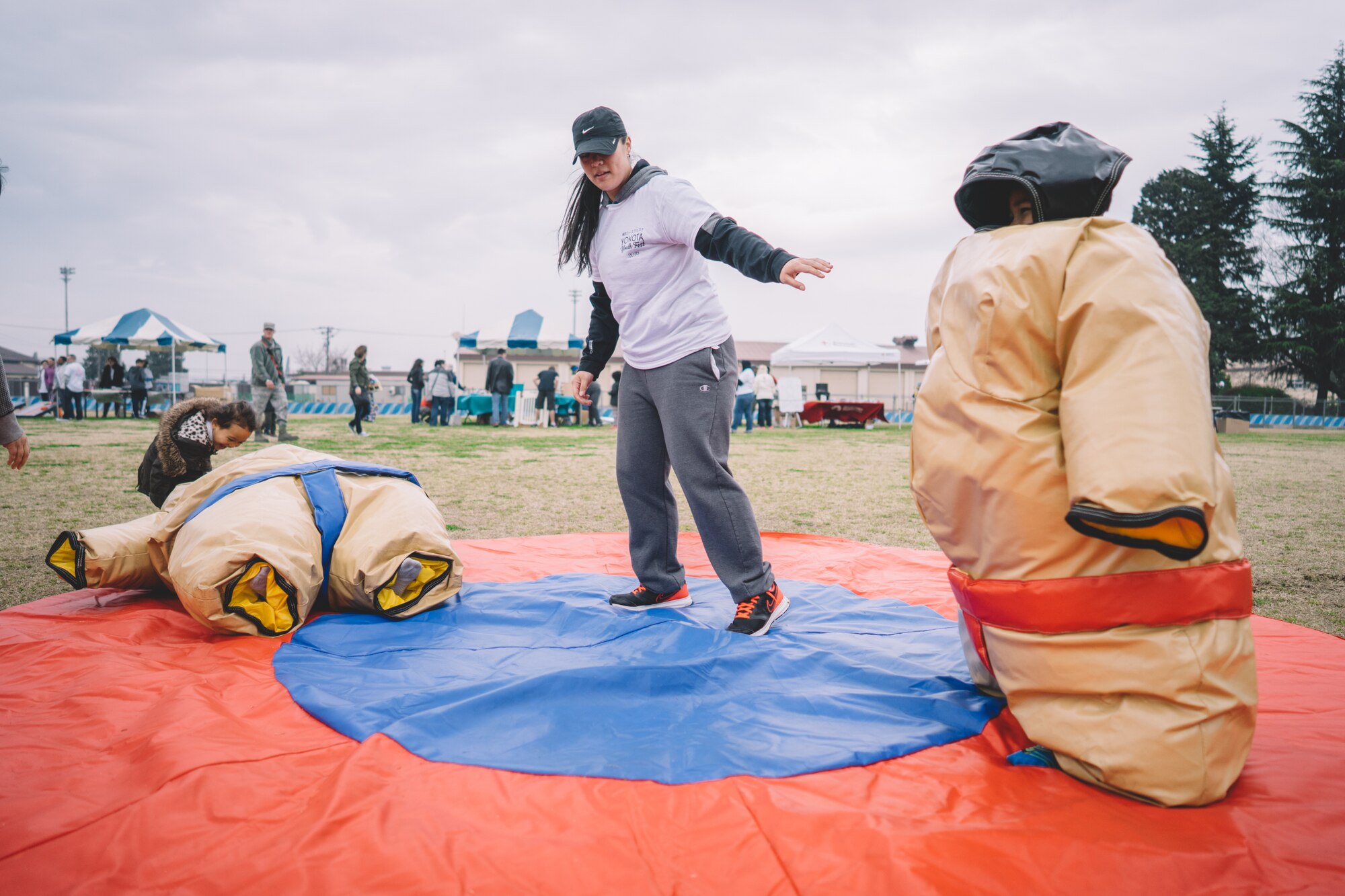 Children sumo wrestle during the Youth Festival at Yokota Air Base, Japan, April 3, 2016. In honor of the Month of the Military Child, the festival helped bring awareness to the contributions and sacrifices that service members' children make year round. (U.S. Air Force photo by Airman 1st Class Delano Scott/Released)