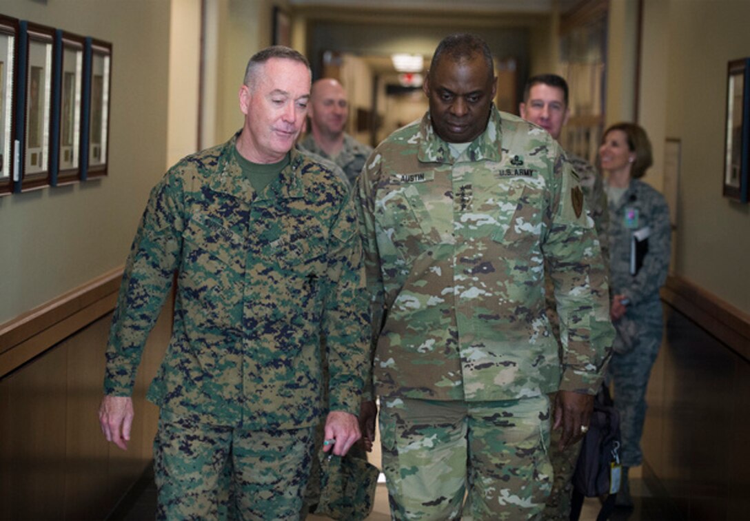 Marine Corps Gen. Joseph F. Dunford Jr., chairman of the Joint Chiefs of Staff, meets with Army Gen. Lloyd J. Austin III, former commander of U.S. Central Command, at CENTCOM headquarters on MacDill Air Force Base, Fla., March 11, 2016. (DoD photo by Navy Petty Officer 2nd Class Dominique A. Pineiro)