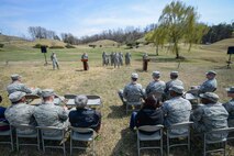 Members of Team Osan attend the 30th anniversary fuel tank explosion ceremony at Osan Air Base, Republic of Korea, April 5, 2016. April 5, 1986, a 40,000-gallon fuel tank burst into flames during routine refueling, which caused 16 individuals to lose their lives. (U.S. Air Force photo by Senior Airman Dillian Bamman/Released)