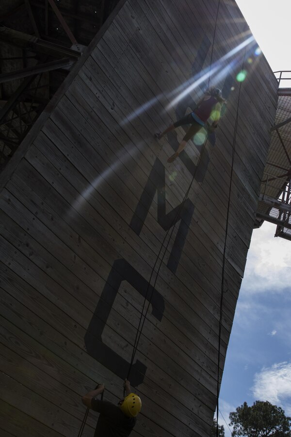 Eileen Flanagan, a Spanish teacher with Westwood High School is Westwood, Mass., rappels down the 47-foot training tower during the Educators’ Workshop aboard Marine Corps Recruit Depot Parris Island, S.C., March 31, 2016. The workshop is a four-day program designed to better inform high school educators and community influencers about the benefits and opportunities available during service in the Marine Corps. This allows the attendees to return to their place of business and provide first-hand experience and knowledge with individuals interested in military service.