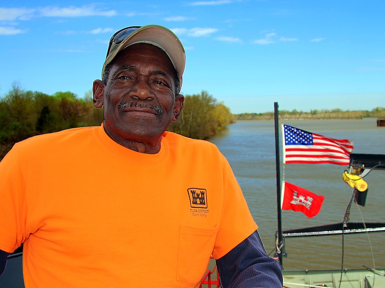 Captain Kelly Youngblood aboard Mr. Pat on the McClellan-Kerr Arkansas River Navigation System at Lock & Dam 14 near Spiro, Oklahoma.  Mr. Pat is the Tulsa District, U.S. Army Corps of Engineers tow boat that facilitates the movement of a 150 foot barge, housing a crane used for major repairs on the five lock & dam systems of the MKARNS within the Tulsa District. 