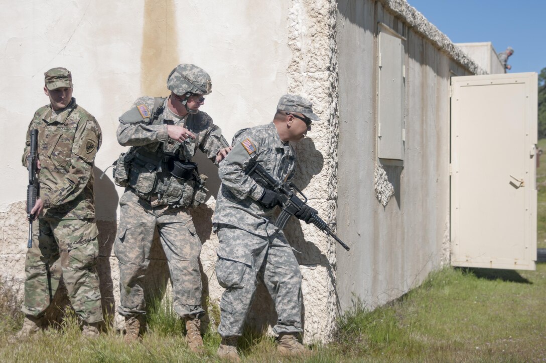 Spc. Ian Duprey, from 437th Civil Affairs Battalion tests his combat skills at the U.S. Army Civil Affairs and Psychological Operations Command Best Warrior Competition at Fort Hunter Liggett, Cali., April 4, 2016. This year’s Best Warrior competition will determine the top noncommissioned officer and junior enlisted Soldier who will represent USACAPOC in the Army Reserve Best Warrior competition later this year. (U.S. Army photo by Spc. Khadijah Lutz-Wilcox, USACAPOC)