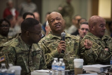 Command Sgt. Maj. Craig Owens, senior enlisted advisor for the 200th Military Police Command, asks a question to a presenter during a four-day workshop and Yearly Training Brief conference held in Columbus, Ohio, on April 2. During the event, battalion and brigade leaders worked to improve their readiness and briefed the commanding general and his command leadership on their units' status. (U.S. Army photo by Master Sgt. Michel Sauret)