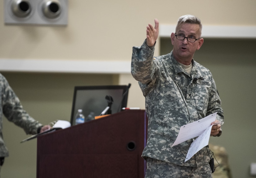 Col. Richard Giles, U.S. Army Reserve commander of the 300th Military Police Brigade, gives a presentation brief to the 200th MP Command leadership and senior staff during a Yearly Training Brief conference held in Columbus, Ohio, on April 3. During the event, battalion and brigade leaders worked to improve their readiness and briefed the commanding general and his command leadership on their units' status. (U.S. Army photo by Master Sgt. Michel Sauret)