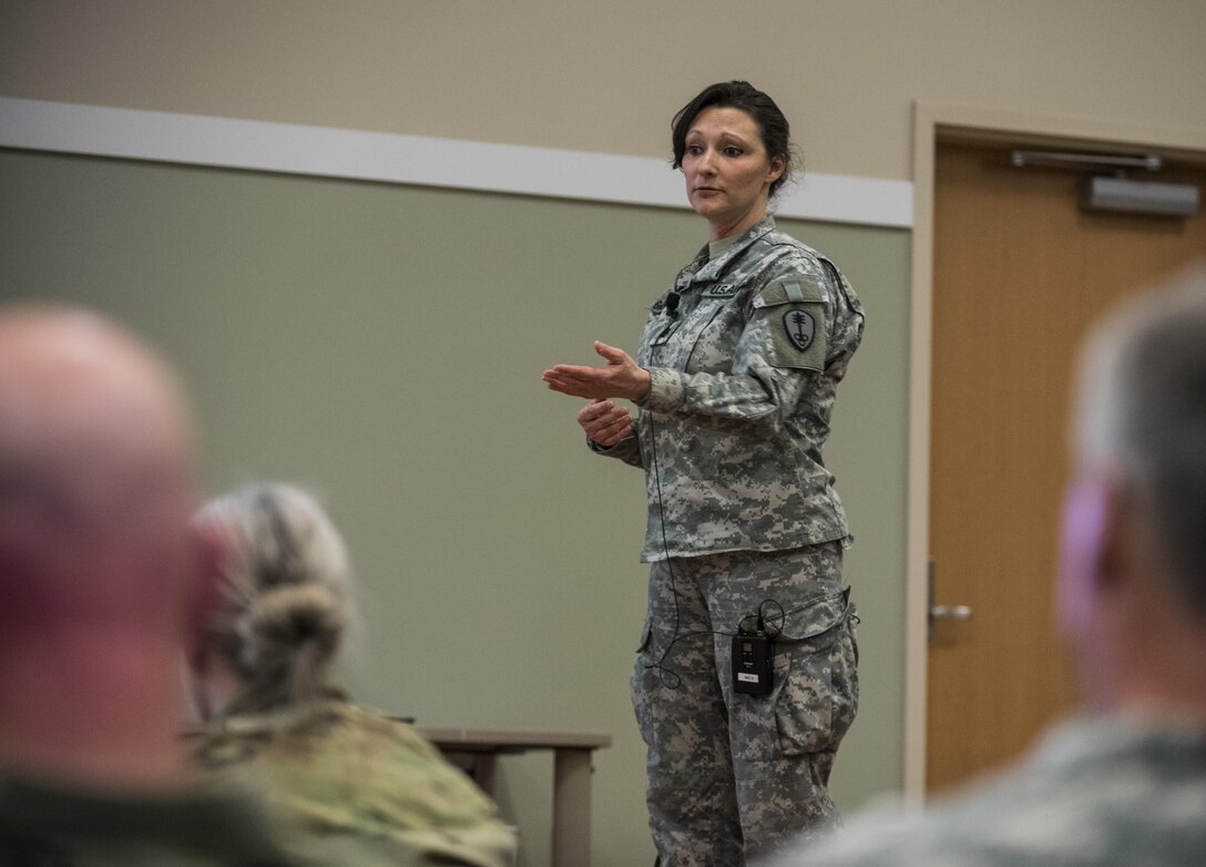 Lt. Col. Shelly Gabriel, U.S. Army Reserve commander of the 391st Military Police Battalion, of Columbus, Ohio, briefs the 200th Military Police Command headquarters leadership and senior staff during a Yearly Training Brief conference held in Columbus, Ohio, on April 3. During the event, battalion and brigade leaders worked to improve their readiness and briefed the commanding general and his command leadership on their units' status. (U.S. Army photo by Master Sgt. Michel Sauret)