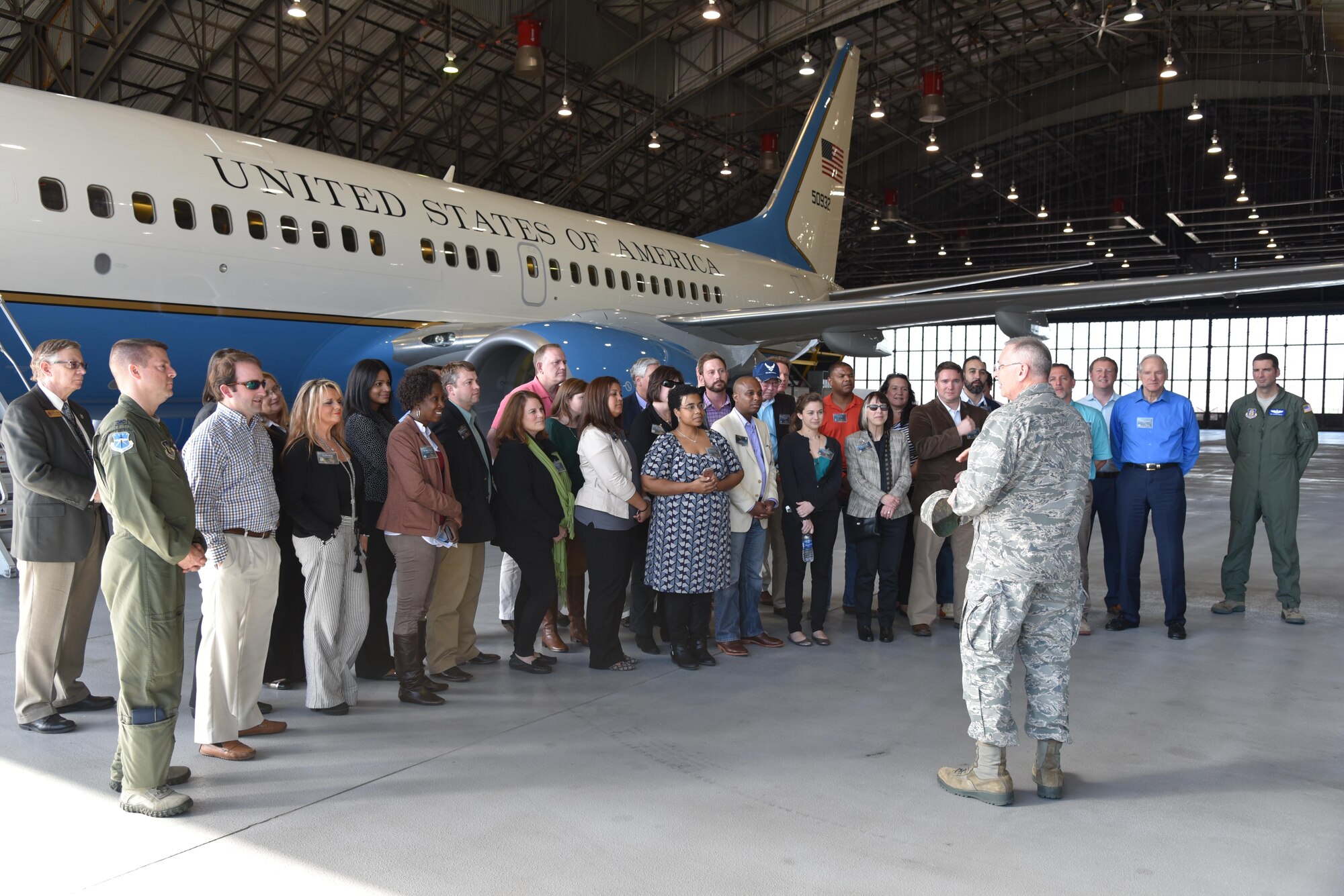 Civic leaders from Mississippi receive a briefing at Scott Air Force Base, Illinois, March 17, regarding a 932nd Airlift Wing C-40 aircraft, which transports U.S. leaders to various locations around the world. These civic leaders joined 403rd Wing leaders from Keesler Air Force Base, Mississippi, on a Civic Leader Tour, March 17-18, to Scott AFB and Dobbins Air Reserve Base, Georgia, to learn about their missions and see what Air Force reservists and guard members accomplish daily in support of their country. (U.S. Air Force photo/Maj. Marnee A.C. Losurdo) 