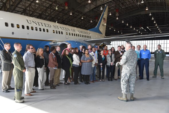 Civic leaders from Mississippi receive a briefing at Scott Air Force Base, Illinois, March 17, regarding a 932nd Airlift Wing C-40 aircraft, which transports U.S. leaders to various locations around the world. These civic leaders joined 403rd Wing leaders from Keesler Air Force Base, Mississippi, on a Civic Leader Tour, March 17-18, to Scott AFB and Dobbins Air Reserve Base, Georgia, to learn about their missions and see what Air Force reservists and guard members accomplish daily in support of their country. (U.S. Air Force photo/Maj. Marnee A.C. Losurdo) 