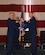 Maj. Gen. John C. Flournoy, Jr., Commander, Fourth Air Force, passes the guidon to the new 507th Air Refueling Wing commander, Col. Douglas E. Gullion, at the change of command ceremony April 2, 2016, at Tinker Air Force Base, Okla. Gullion is a command pilot who has served nearly 30 years and has flown more than 6,500 flight hours. (U.S. Air Force photo/Tech. Sgt. Lauren Gleason)