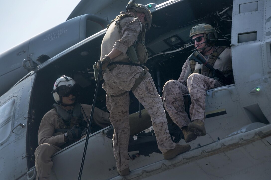 Marines participate in rappel training from a UH-1 helicopter aboard the USS Boxer in the Pacific Ocean, April 1, 2016. Marine Corps photo by Sgt. Briauna Birl