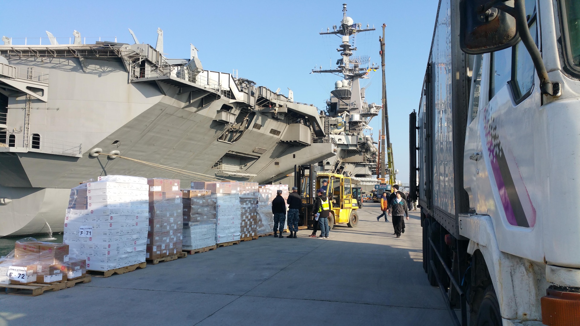 Navy and Subsistence prime vendor personnel load the USS Stennis with food March 16 before the aircraft carrier departs Naval Base Busan, Republic of Korea, for Operation Foal Eagle. The annual training exercise promotes the partnership between the United States and South Korea.