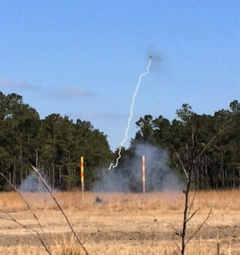 Marines attached to Combat Engineer Officer course 2-16 (CEO 2-16) fire the Anti-Personnel Obstacle Breaching System (APOBS) at Marine Corps Engineer School aboard Camp Lejeune, N.C. The system is a rocket propelled line charge composed of 108 grenades that can clear a 45 meter by 1 meter path through mines and wire obstacles. 
