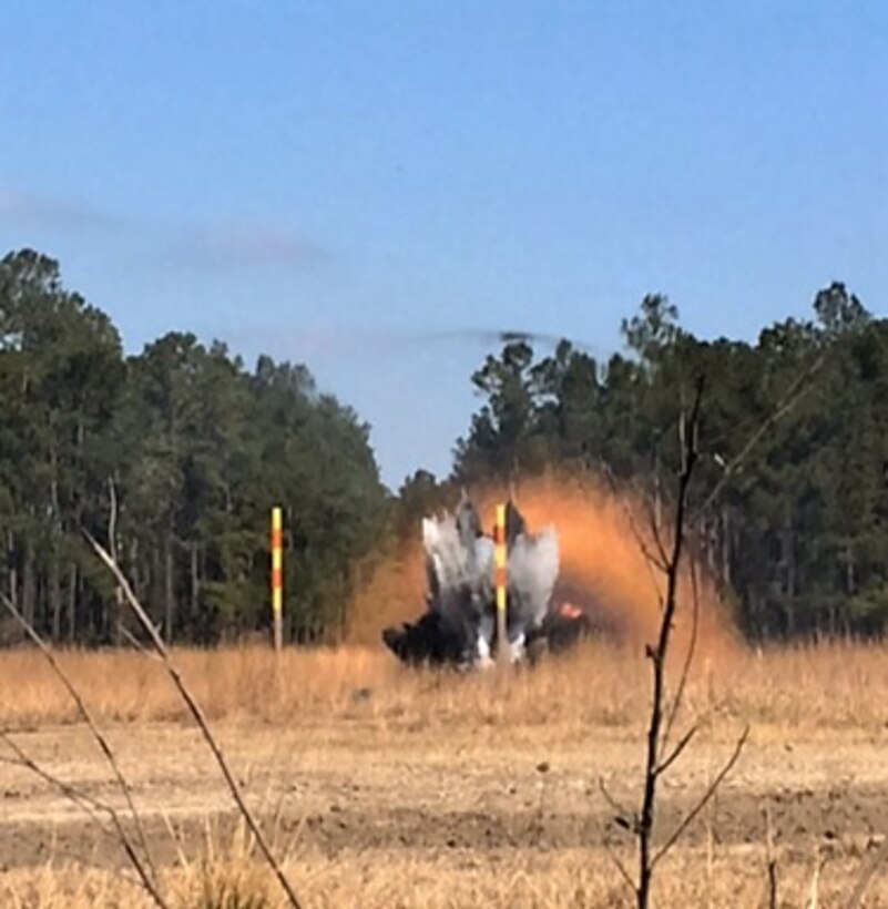 Marines attached to Combat Engineer Officer course 2-16 (CEO 2-16) watch as the Anti-Personnel Obstacle Breaching System (APOBS) clears a 45 meter by 1 meter path at a training area at Marine Corps Engineer School aboard Camp Lejeune, N.C. 