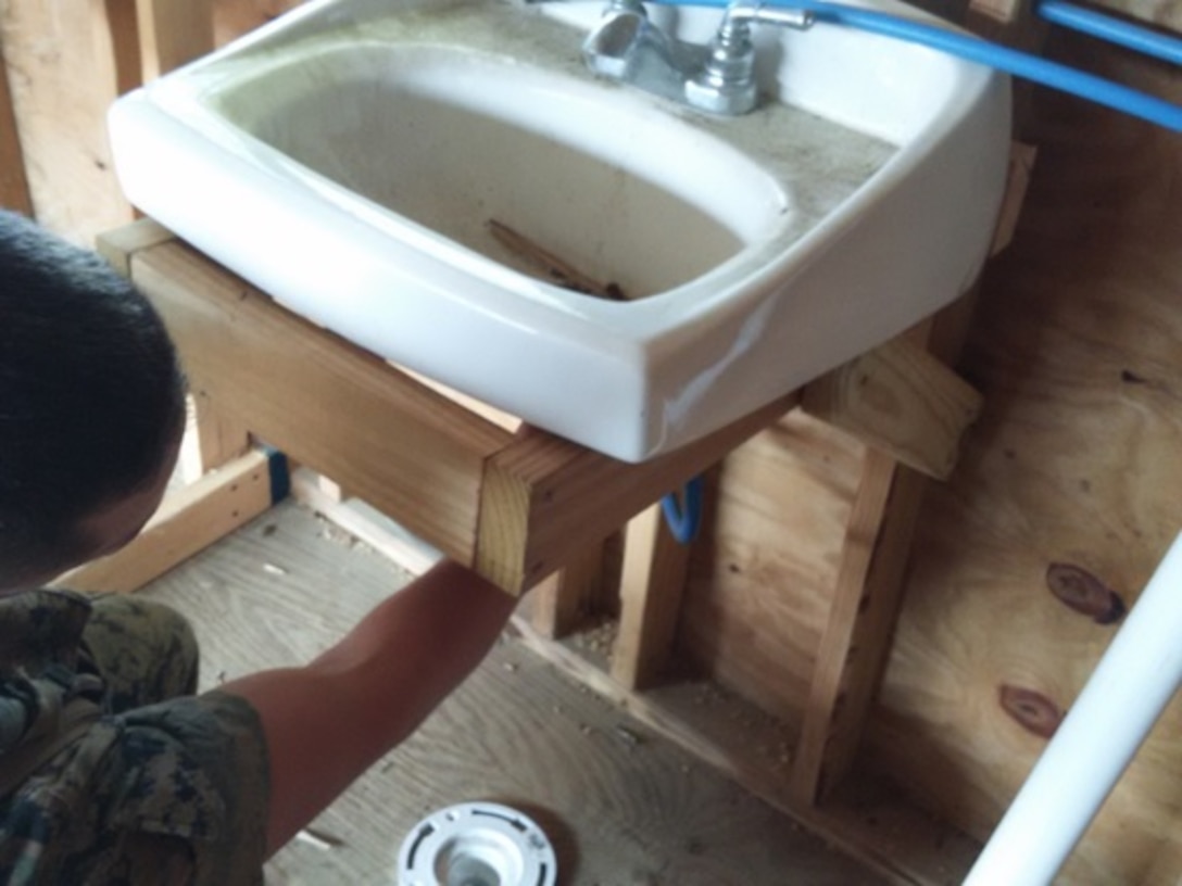 Marines assigned to Basic Water Support Technician course 3-16 (BWST 3-16) at Marine Corps Engineer School, Camp Lejeune, N.C. conduct a plumbing fixture practical application. This practical application reinforces classroom instruction and will enable the Marines to correctly identify, size, cut, solder, and emplace plumbing fixtures. 
