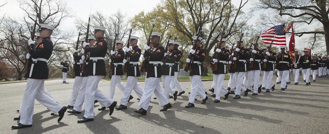 U.S. Marines with Marine Barracks Washington, D.C. march through Arlington National Cemetery during a funeral for retired Gen. Earl E. Anderson, former assistant commandant of the Marine Corps, Arlington, Va., March 31, 2016. Anderson was the first active duty Marine Naval Aviator to be promoted to a four-star rank, and he became the assistant commandant of the Marine Corps on April 1, 1972. (U.S. Marine Corps photo by Cpl. Samantha K. Draughon/Released)