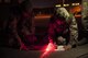 U.S. Air Force Airmen from the 18th Civil Engineer Squadron conduct nighttime airfield damage repair training at the Silver Flag training site April 5, 2016, on Kadena Air Base, Japan. The 18th CES plays an integral role as a fast response repair force by reestablishing damaged runways in order to maintain aircraft combat and logistical capabilities. (U.S. Air Force photo by Senior Airman Peter Reft/Released)