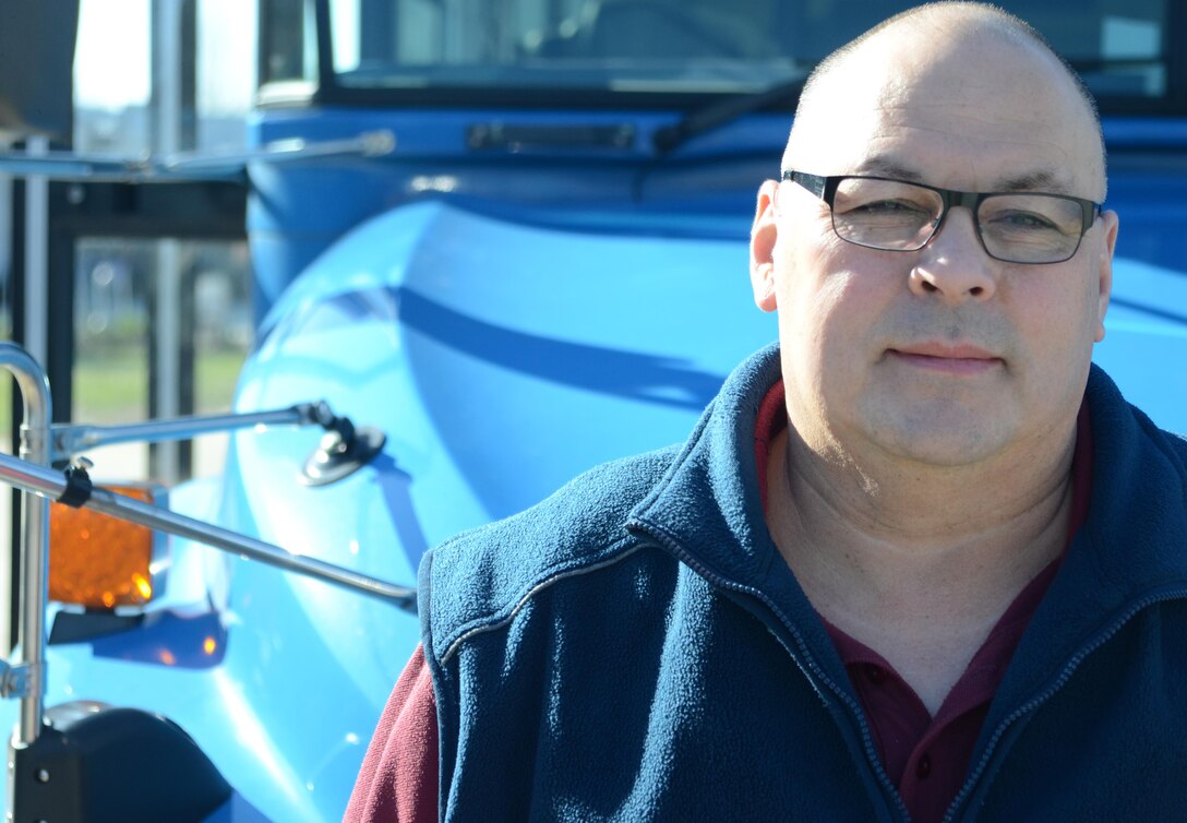 Glenn H. Bulaon, a shuttle bus driver for Skookum Contract Services, and other DINFOS bus drivers make a special point of taking care of the students who ride their buses. Bulaon frequently points out places of interest on Fort Meade.