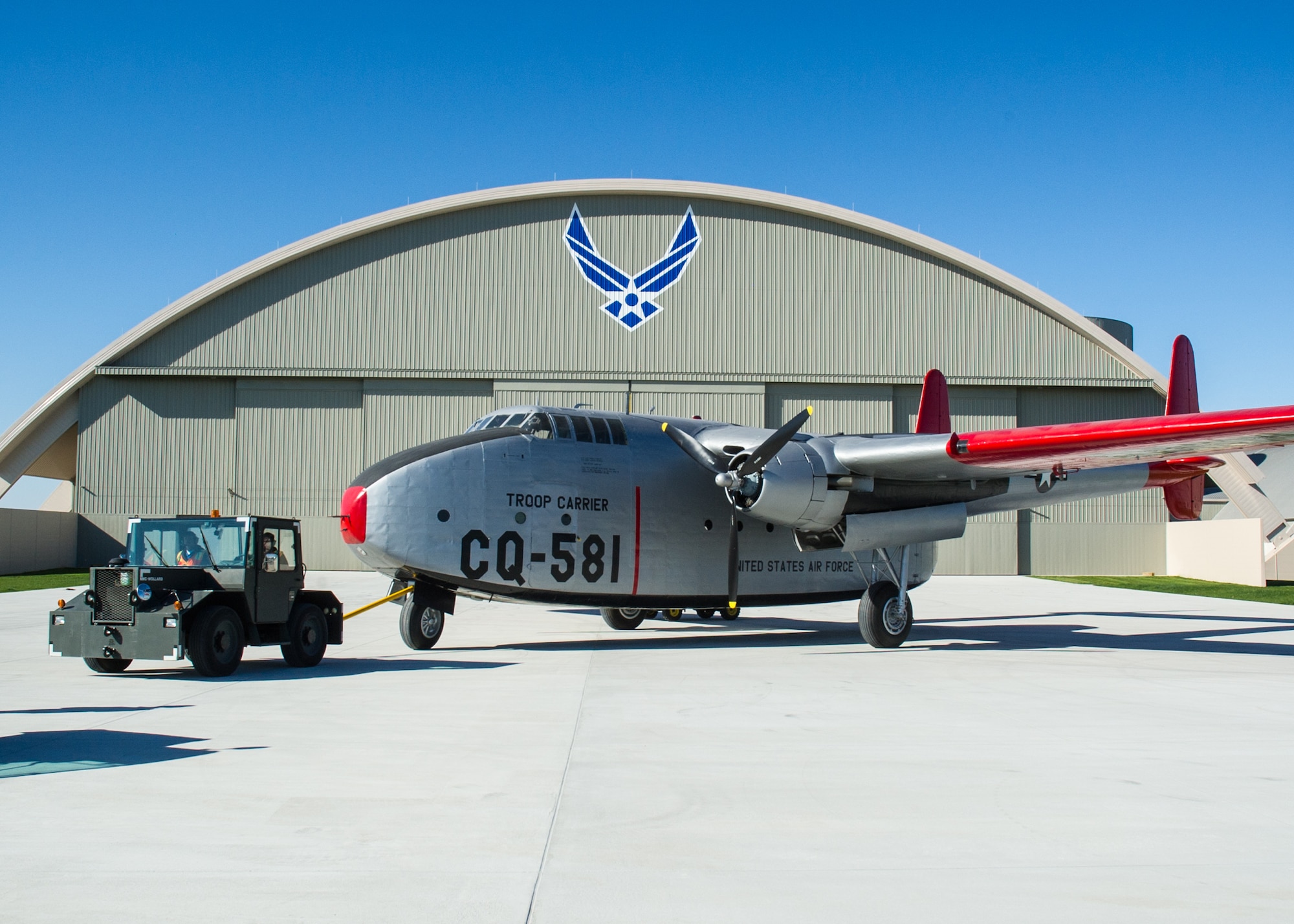 DAYTON, Ohio -- Fairchild C-82 Packet being moved into the fourth building at the National Museum of the United States Air Force on April 5, 2016. (U.S. Air Force photo by Ken LaRock)