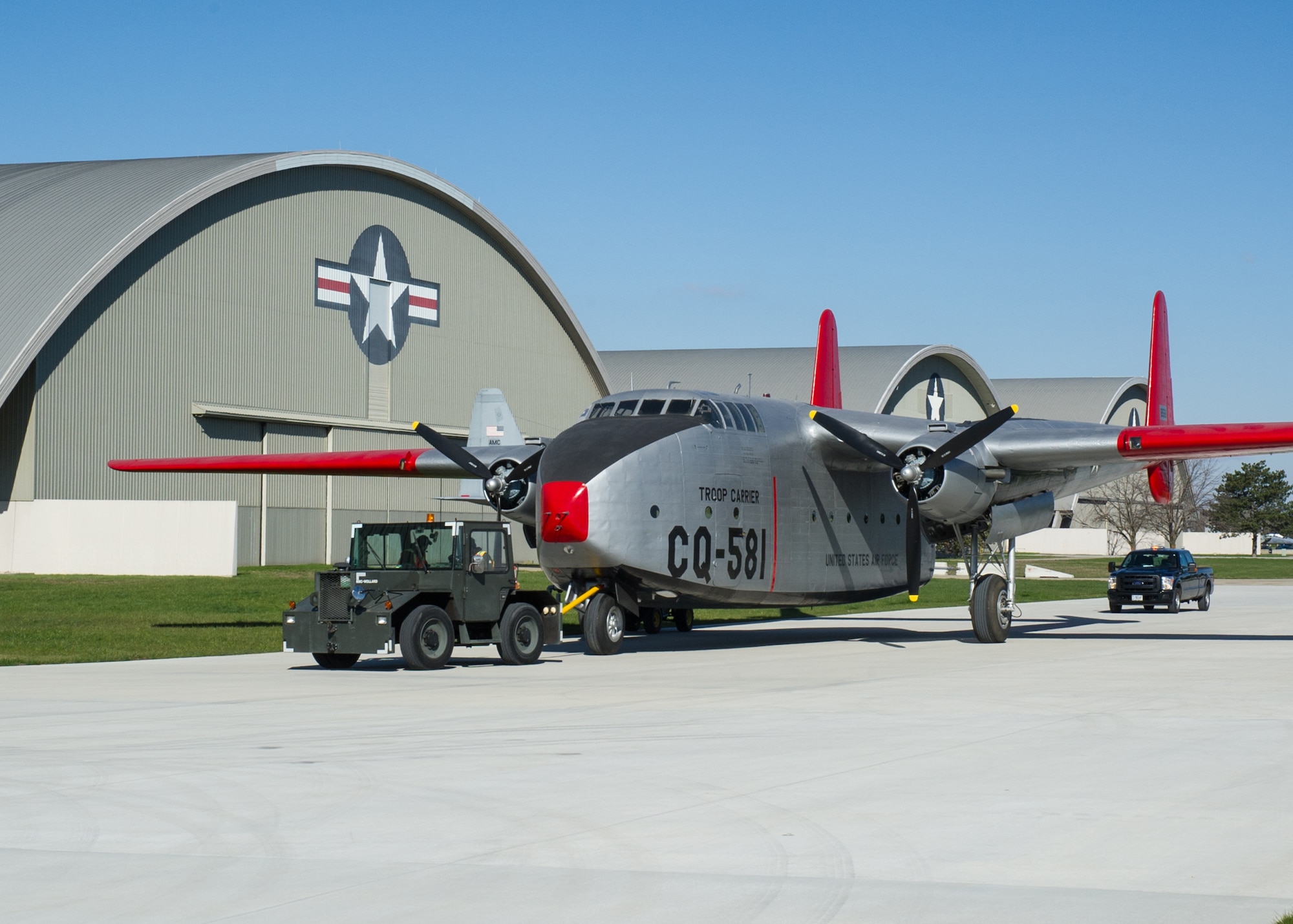 DAYTON, Ohio -- Fairchild C-82 Packet being moved into the fourth building at the National Museum of the United States Air Force on April 5, 2016. (U.S. Air Force photo by Ken LaRock)