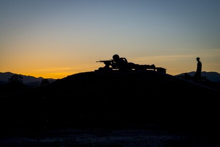 Spc. Christopher Ruff, representing the 350th Civil Affairs Command, competes in the night fire range at the U.S. Army Civil Affairs and Psychological Operations Command 2016 U.S. Army Best Warrior Competition at Fort Hunter Liggett, Calif., April 5, 2016. This year’s Best Warrior competition will determine the top noncommissioned officer and junior enlisted Soldier who will represent USACAPOC in the Army Reserve Best Warrior competition later this year. (U.S. Army photo by Master Sgt. Mark Burrell, 352nd CACOM)