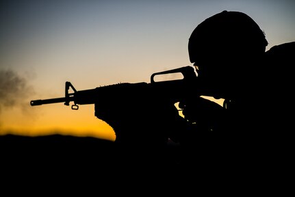 Spc. Christopher Ruff, representing the 350th Civil Affairs Command, competes in the night fire range at the U.S. Army Civil Affairs and Psychological Operations Command 2016 U.S. Army Best Warrior Competition at Fort Hunter Liggett, Calif., April 5, 2016. This year’s Best Warrior competition will determine the top noncommissioned officer and junior enlisted Soldier who will represent USACAPOC in the Army Reserve Best Warrior competition later this year. (U.S. Army photo by Master Sgt. Mark Burrell, 352nd CACOM)