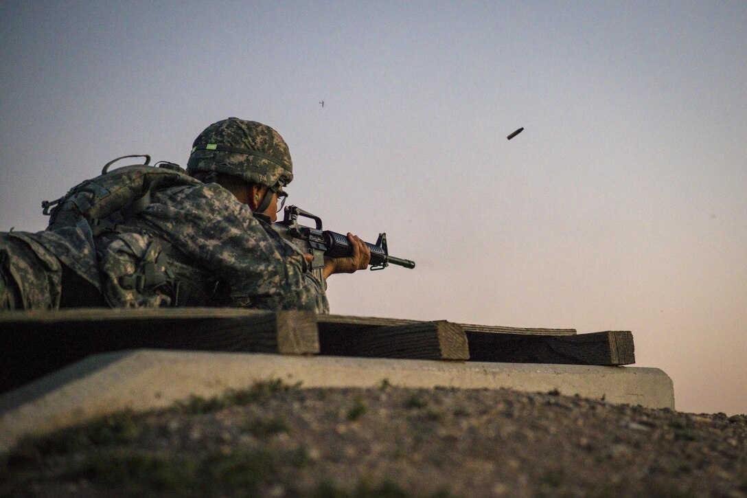 Spc. Jessie Guerrero, representing the 151st Theater Information Operations Group, competes in the night fire range at the U.S. Army Civil Affairs and Psychological Operations Command 2016 U.S. Army Best Warrior Competition at Fort Hunter Liggett, Calif., April 5, 2016. This year’s Best Warrior competition will determine the top noncommissioned officer and junior enlisted Soldier who will represent USACAPOC in the Army Reserve Best Warrior competition later this year. (U.S. Army photo by Master Sgt. Mark Burrell, 352nd CACOM)
