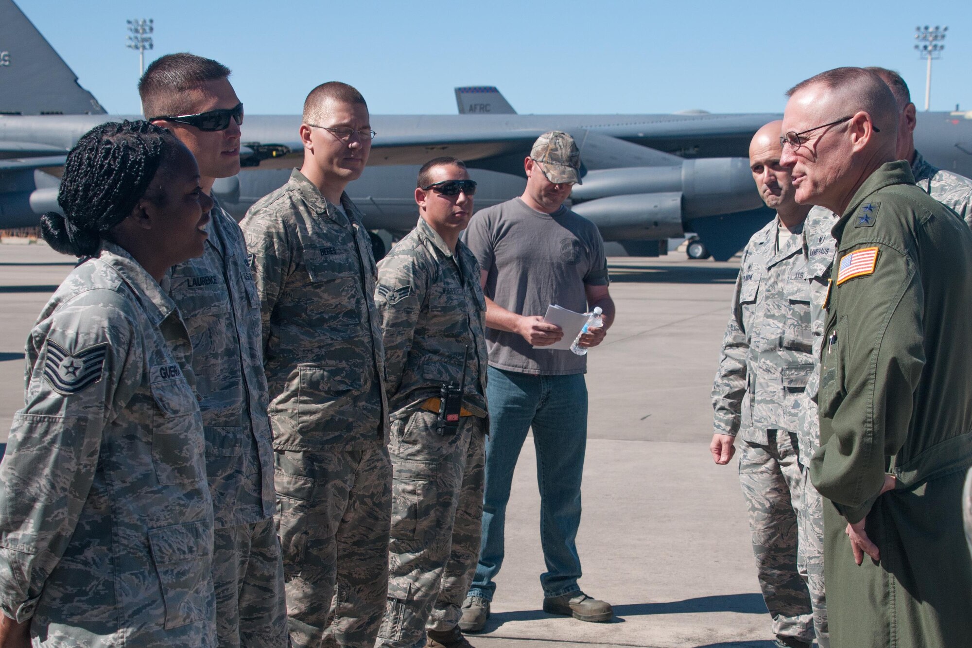 The AFRC Director of Air, Space and Information Operations, Maj. Gen. Ken Lewis, speaks to crew chiefs and weapons loaders at a B-52 Stratofortress on Barksdale Air Force Base, La. on April 4th. Lewis received a tour of the bomber from the Airmen during a visit to the 307th Bomb Wing. (U.S. Air Force photo by Master Sgt. Dachelle Melville)