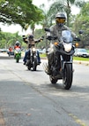 Military members from Headquarters Pacific Air Forces and 15th Wing ride across the installation after receiving a motorcycle safety briefing during Motorcycle Safety Day on Joint Base Pearl Harbor-Hickam, April 1, 2016. Approximately 175 motorcycle riders from JBPHH met up at the Hickam Memorial  Theater to talk about motorcycle safety as well as share personal stories and experiences pertaining to riding. The motorcycle safety event fulfilled an Air Force annual requirement for motorcycle riders. (U.S. Air Force photo by Tech. Sgt. Aaron Oelrich/released) 