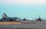 F-16 Fighting Falcons taxi down the flightline during a surge operation at Misawa Air Base, Japan, April 5, 2016. The exercise was conducted to validate the 35th Fighter Wing’s ability to generate aircraft in a simulated combat scenario, with more than 70 sorties per fighter squadron being flown each day. 