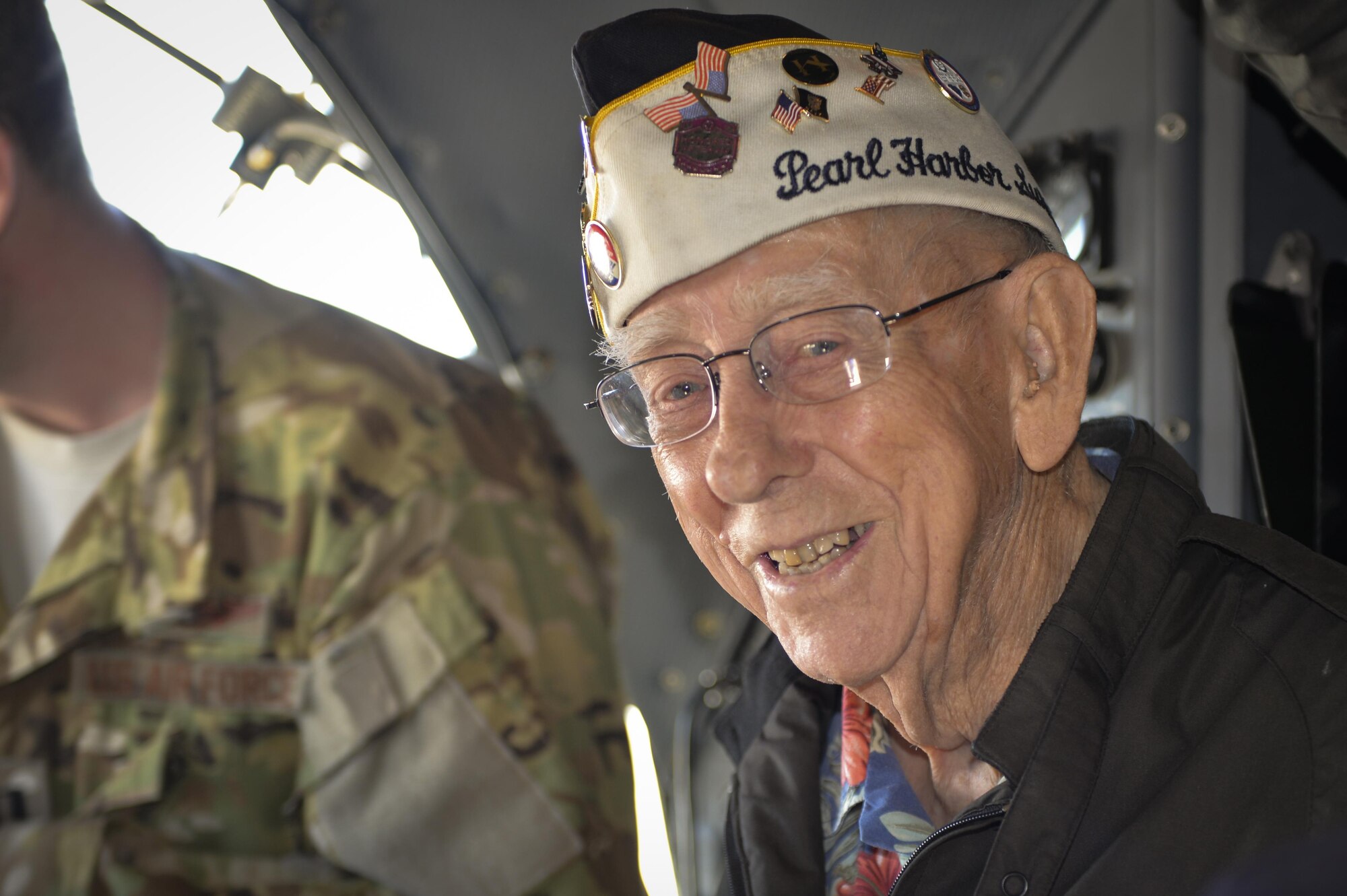 Retired U.S Navy Chief Petty Officer Jay Carraway, a Pearl Harbor survivor, listens to an AC-130U Spooky Gunship capabilities brief at Hurlburt Field, Fla., April 5, 2016. Carraway was a Signalman Striker aboard the USS Hulbert and manned a gun during the attack on Pearl Harbor. The gun was later credited for shooting down a Japanese torpedo plane. (U.S. Air Force photo by 2nd Lt. Jaclyn Pienkowski)