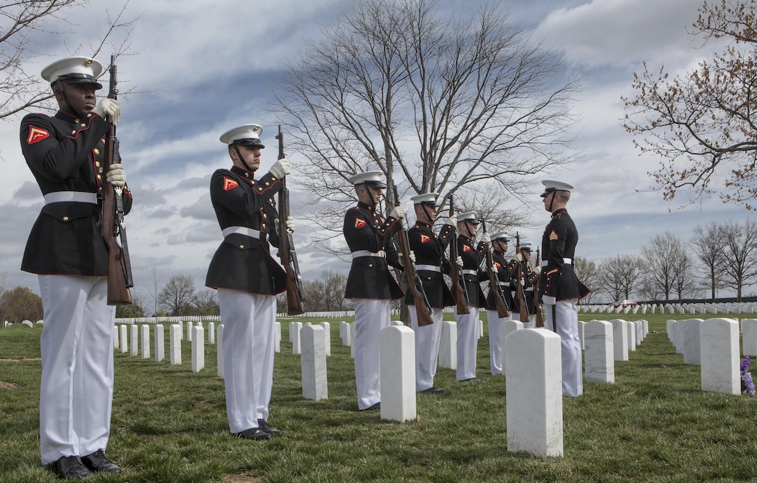 U.S. Marines from Marine Barracks Washington, D.C. prepare to fire a three-volley salute at a funeral for retired U.S. Marine Corps Gen. Earl E. Anderson, former assistant commandant of the Marine Corps, at Arlington National Cemetery, Arlington, Virginia, March 31, 2016. Anderson was the first active duty Marine Naval Aviator to be promoted to a four-star rank.