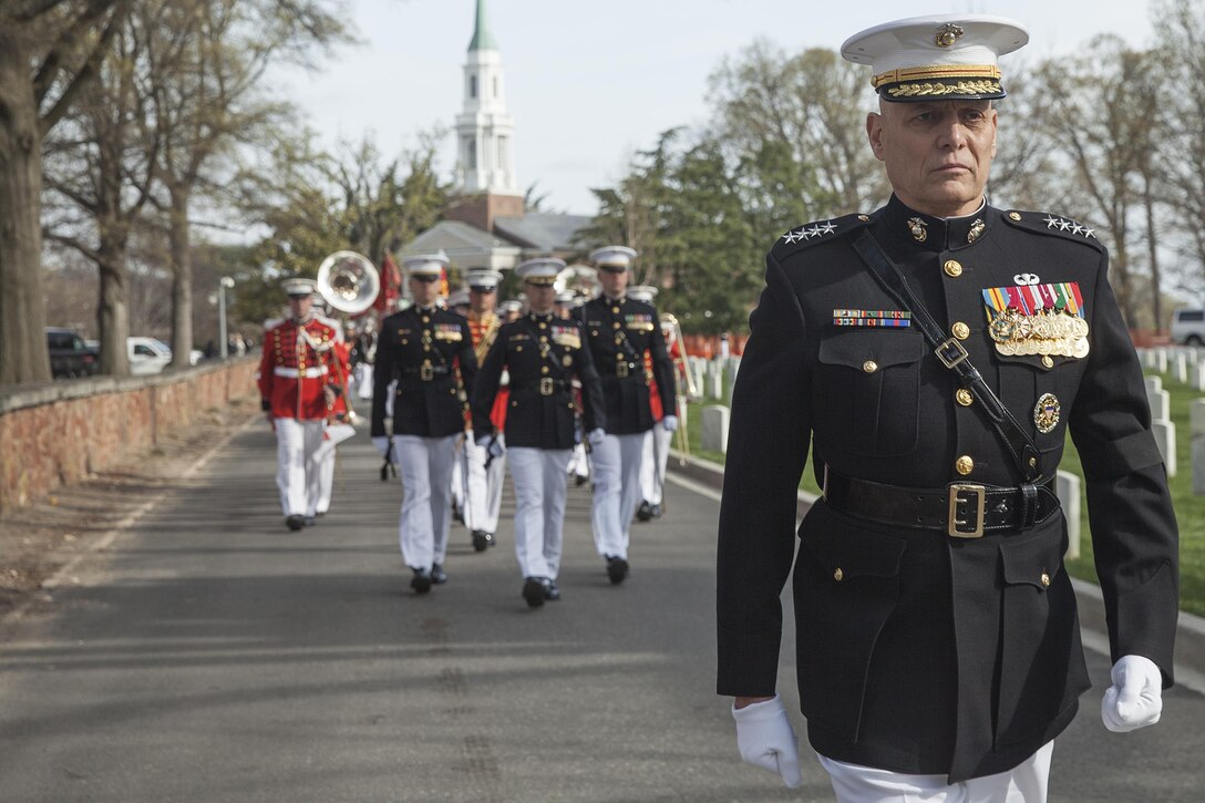 U.S. Marine Corps Gen. John M. Paxton, assistant commandant of the Marine Corps, leads a procession through Arlington National Cemetery during a funeral for retired Gen. Earl E. Anderson, former assistant commandant of the Marine Corps, Arlington, Va., March 31, 2016. Anderson was the first active duty Marine Naval Aviator to be promoted to a four-star rank, and he became the assistant commandant of the Marine Corps on April 1, 1972. (U.S. Marine Corps photo by Cpl. Samantha K. Draughon/Released)