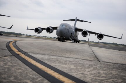 A C-17 Globemaster III arrives at Joint Base Charleston, April 1, 2016,  after delivering family members to Baltimore, Maryland,  during an ordered departure from Turkey. Members from the 14th and 15th Airlift Squadrons and the 437th Aircraft Maintenance Squadron comprised one of the first aircrews involved in the mission. (U.S. Air Force photo/Staff Sgt. Jared Trimarchi) 