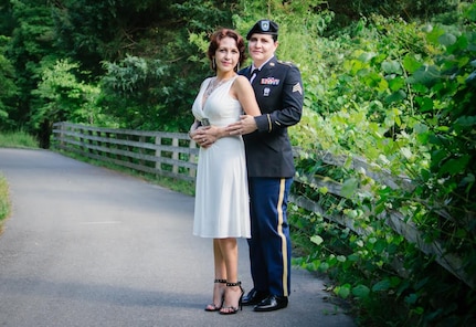 Army Sergeant Mariela Payan, 841st Transportation Battalion documentation non-commissioned officer, poses with her wife, Nelideisy Fernandez, at their wedding in South Carolina, in April 2015. Payan’s family came from Cuba, Ireland, Indiana and North Carolina just to attendcome to their wedding. Payan was recognized during Women’s History Month for her overall professional skills and the importance of her job to the base and the rest of the East Coast. (U.S. Air Force photo/Airman 1st Class Thomas T. Charlton)