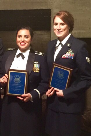 Capt Natassia Cherne, 1st Combat Camera Squadron assistant director of
operations, left, and Staff Sgt. Sandra Welch, 1st CTCS aerial combat
photojournalist, stand together after winning the Military Woman of the Year
award in their respective grade category Founders Hall at Charles Towne
Landing, Feb. 25, 2016.  The Women in Defense, Palmetto Chapter hosts the
MWOY event annually to honor the women in the armed forces and to show
gratitude for their service to the country.