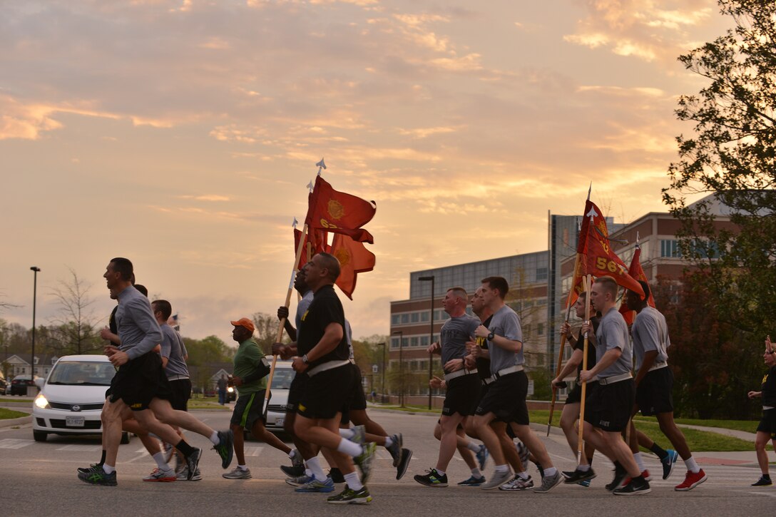 U.S Soldiers near the end of the Sexual Assault Awareness Month 5K at Fort Eustis, Va., April 1, 2016. Joint Base Langley-Eustis is holding several events throughout the month of April to spotlight the importance of preventing sexual assault and harassment. (U.S. Air Force photo by Staff Sgt. Natasha Stannard)
