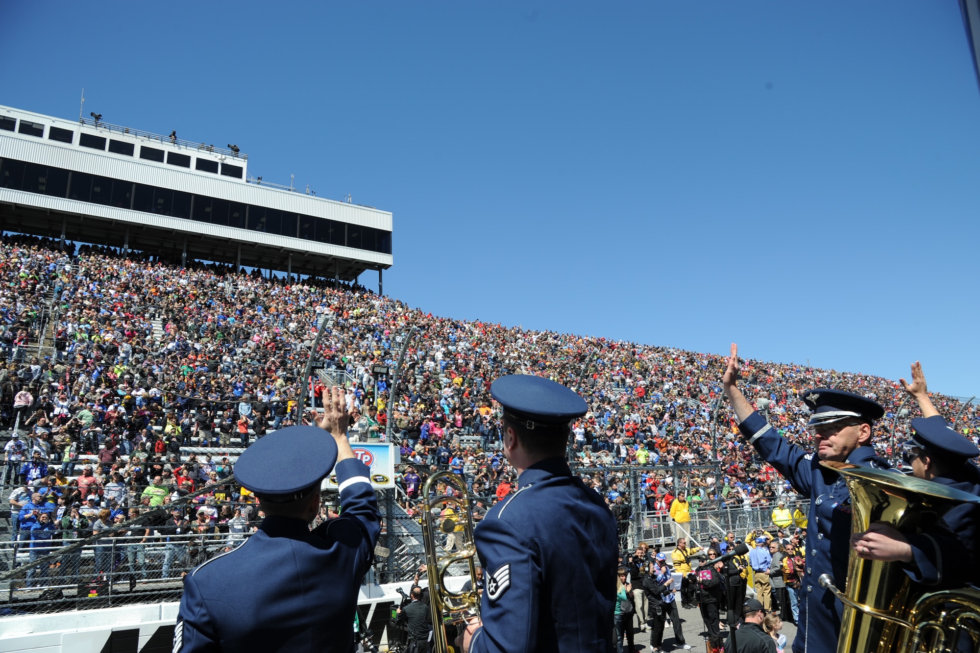 U.S. Air Force Heritage of America Band, Full Spectrum, perform for a crowd of NASCAR fans at Martinsville, Va., April 3, 2016.  Full Spectrum, a six-member Pop and Hip-Hop band deliver the Air Force message with excellence and professionalism through their exciting and engaging music.  (U.S. Air Force photo by Staff Sgt. William Anger)

