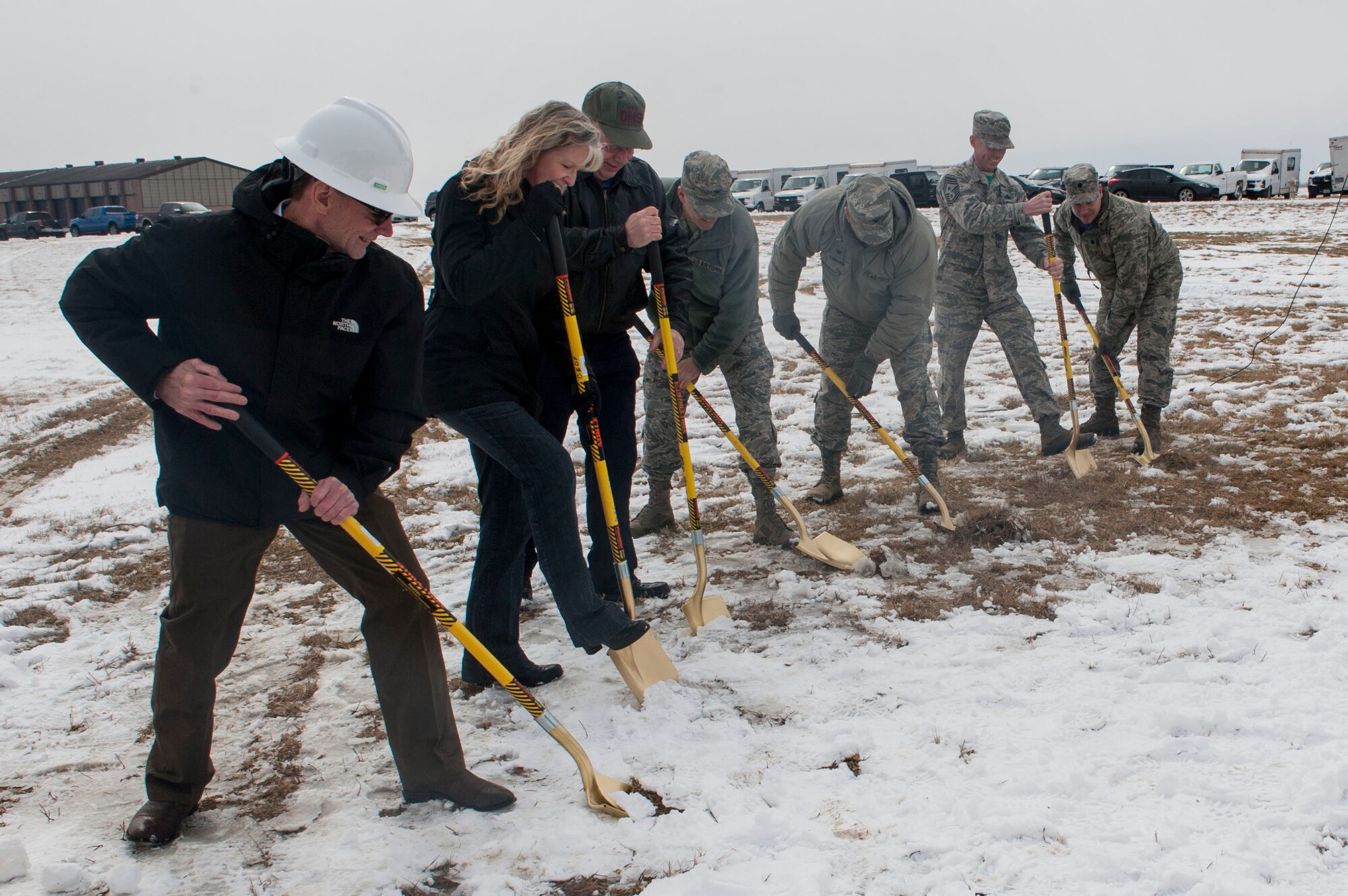 The 5th Aircraft Maintenance Squadron from Minot Air Force Base, N.D. hosted a ground-breaking ceremony for the new aircraft maintenance unit facility April 1, 2016. 5th Bomb Wing leadership, various contractors and approximately 200 maintenance Airmen attended the ceremony. The 5th AMXS is currently split into separate buildings throughout the flight line, some in which were constructed in the 1950s. The new AMU facility will provide consolidation and needed updates for the maintainers. (U.S. Air Force photo/Airman 1st Class Jessica Weissman)