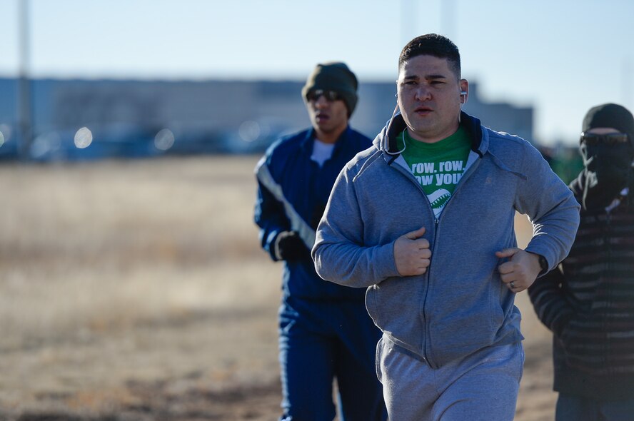 Master Sgt. Steven Grant, 50th Space Communications Squadron, participates in the 2016 St. Paddy's Day Fun Run at Schriever Air Force Base, Colorado, Wednesday, March 30, 2016. One-hundred-seventy-two base personnel participated in the event. (U.S. Air Force photo/Christopher DeWitt)