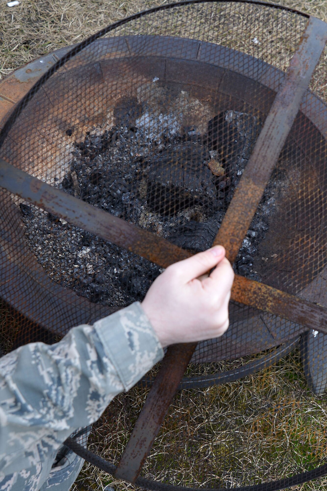 According to 673d Civil Engineer Squadron Fire Department, fire pits are required to have spark screens on Joint Base Elmendorf-Richardson. Negligence is cited as one of the biggest fire hazards by the 673d Civil Engineer Squadron Fire Department. (U.S. Air Force photo by Airman 1st Class Javier Alvarez)