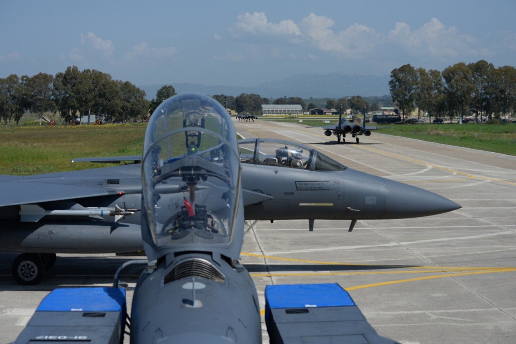 U.S. Air Force F-15E Strike Eagles assigned to the 492nd Fighter Squadron, Royal Air Force Lakenheath, England, taxi to the runway, April 4, 2016, during exercise INIOHOS 16 at Andravida Air Base, Greece. Training engagements such as INIOHOS 16 strengthen our relationships, maintain joint readiness and interoperability, and reassure our regional allies and partners. (U.S. Air Force photo by Tech. Sgt. Eric Burks/Released)