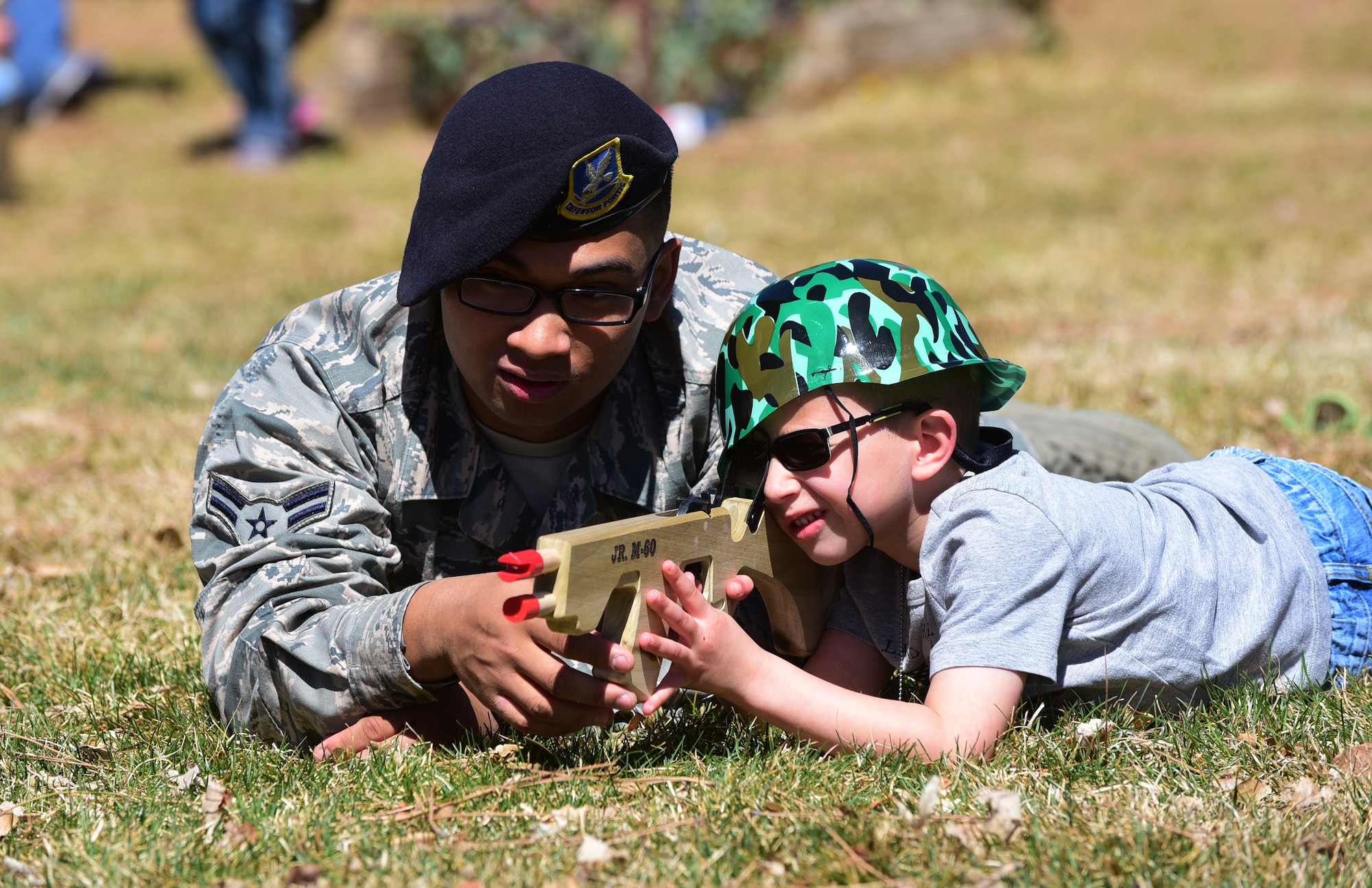 PETERSON AIR FORCE BASE, Colo. - Children of military members in the Colorado Springs area learn various skills at the 21st Force Support Squadron’s Kids Understanding Deployment Operations event at Peterson Air Force Base, Apr. 2, 2016. K.U.D.O.S. is designed to help base youth gain insight into the deployment process and geared to ease the strain of deployments on military families. (U.S. Air Force photo by Staff Sgt. Amber Grimm)