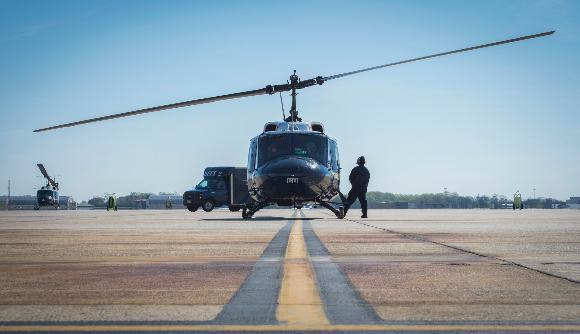 1st Helicopter Squadron aircrew prepares for take-off in a UH-1N Iroquois at Joint Base Andrews, Md., April 6, 2016. The flight was part of the Turkish Air Force Chief of Staff visit to the U.S. to show the 1 HS operations. (U.S. Air Force photo by Senior Airman Ryan J. Sonnier/RELEASED)