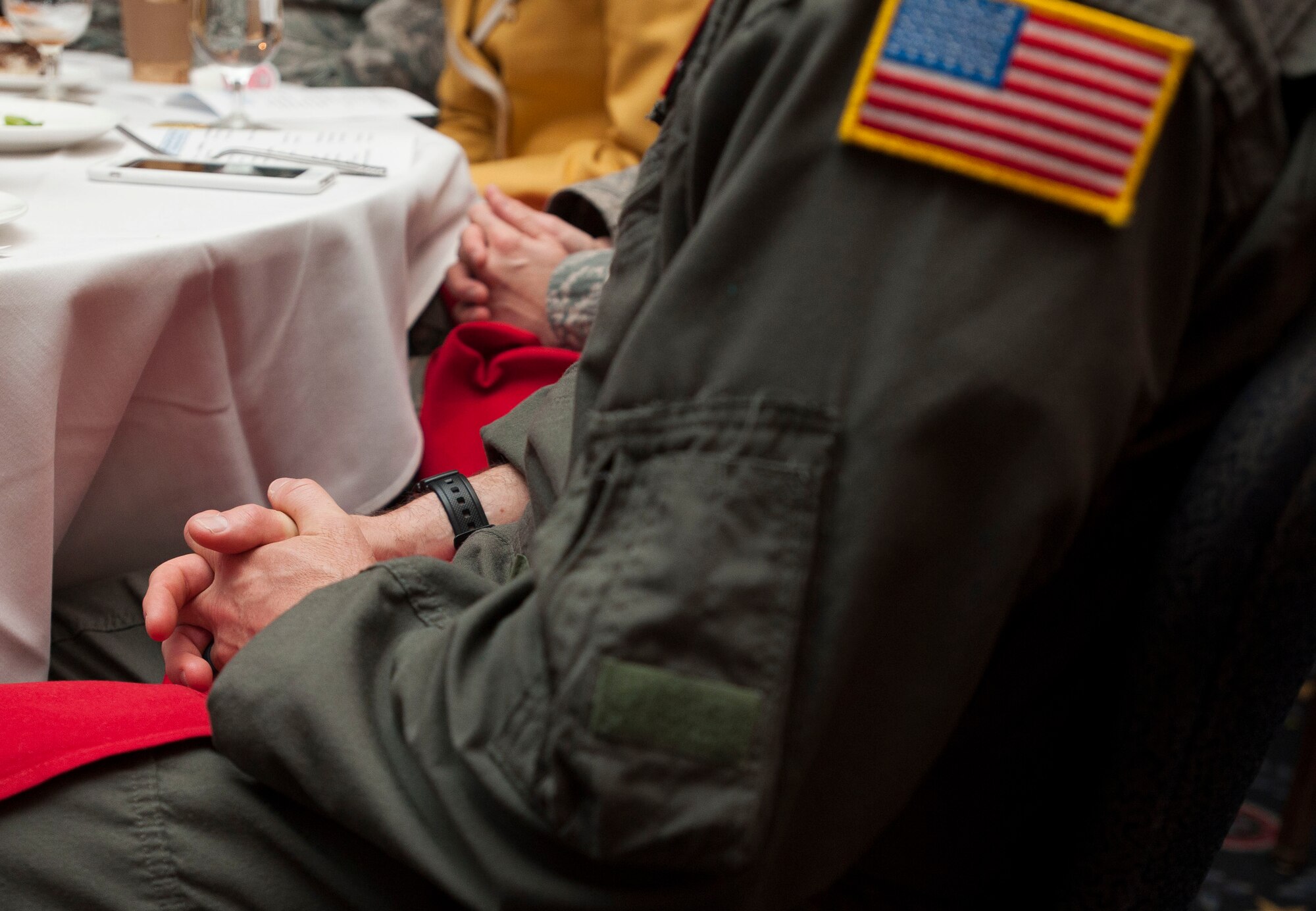 Members of Joint Base Andrews attend the National Prayer Luncheon here April 5, 2016. Guest speaker Chaplain (Brig. Gen.) Steven A. Schaick, U. S. Air Force’s Deputy Chief of Chaplains, addressed approximately 80 JBA members. The National Prayer Luncheon is modeled after the National Prayer Breakfast first attended by former President Dwight D. Eisenhower in 1953. (U.S. Air Force photo by Airman 1st Class Rustie Kramer/Released)  
