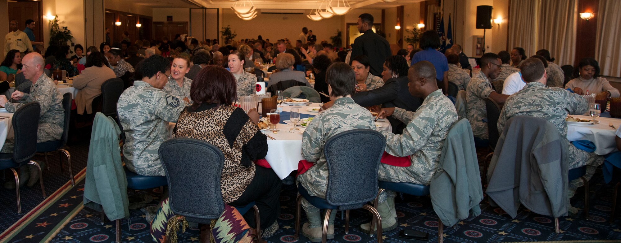 Members of Joint Base Andrews attend the National Prayer Luncheon here April 5, 2016. Guest speaker Chaplain (Brig. Gen.) Steven A. Schaick, U. S. Air Force’s Deputy Chief of Chaplains, addressed approximately 80 JBA members. The National Prayer Luncheon is modeled after the National Prayer Breakfast first attended by former President Dwight D. Eisenhower in 1953. (U.S. Air Force photo by Airman 1st Class Rustie Kramer/Released) 