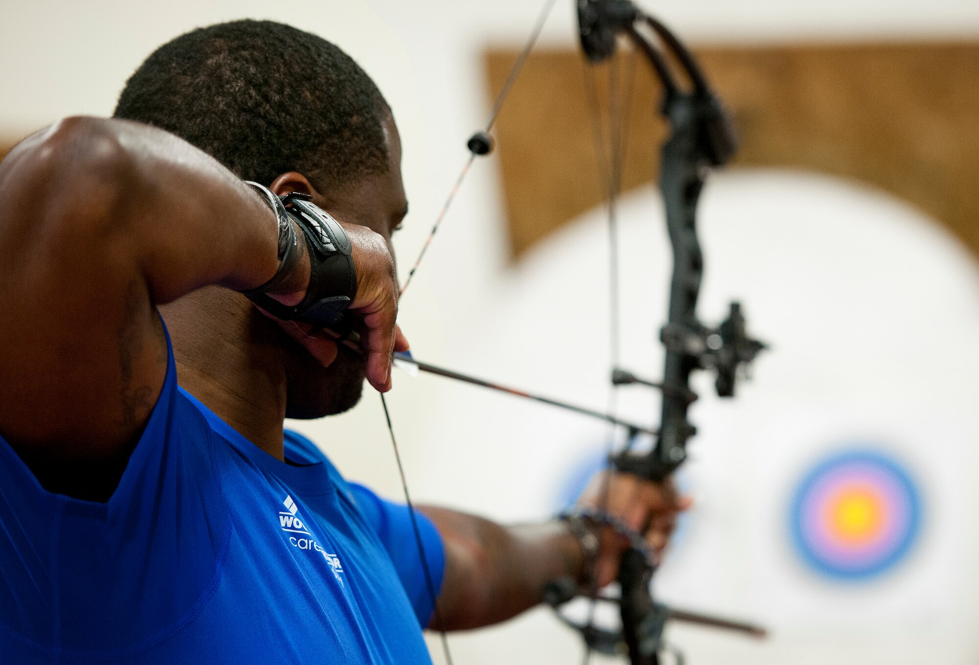 Jason Curry, a Warrior Care attendee, lines up his shot during a morning archery session at the Air Force team’s training camp at Eglin Air Force Base, Fla., April 5.  The base-hosted, week-long Warrior Games training camp is the last team practice session before the yearly competition in June.  (U.S. Air Force photo/Samuel King Jr.)