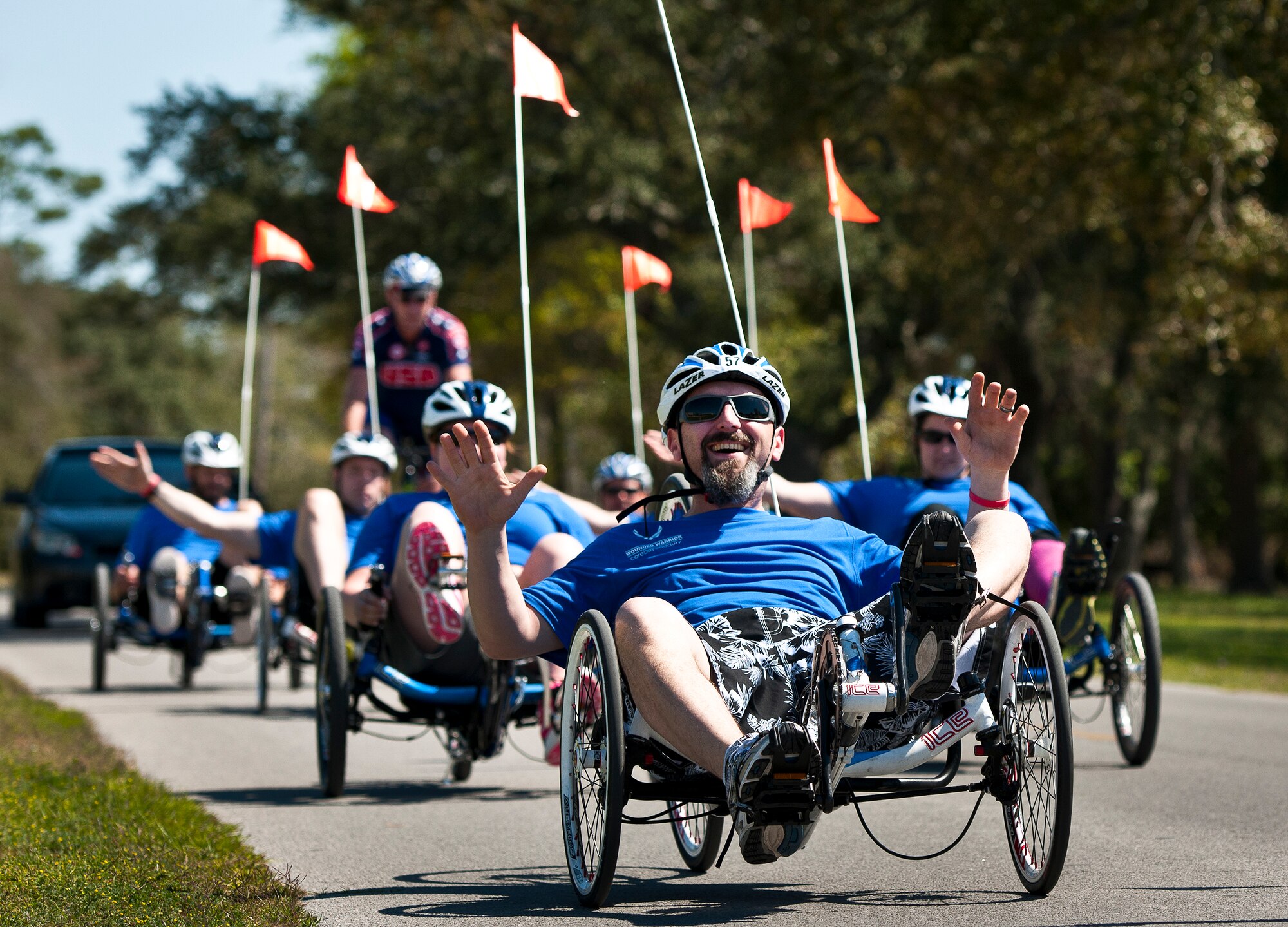 Dustin Goodwin, a Warrior Care attendee, pedals a “hands-free” recumbent bike during a morning cycling session at the adaptive sports camp at Eglin Air Force Base, Fla., April 5.  The base hosts the week-long Wound Warrior Care event that helps recovering wounded, ill and injured military members through specific hand-on rehabilitative training.  (U.S. Air Force photo/Samuel King Jr.)